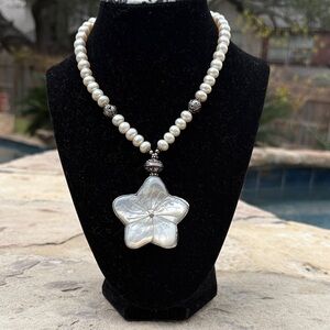 Elegant Pearl Necklace with Mother of Pearl Flower Pendant